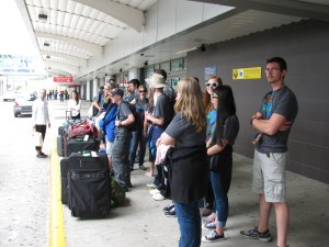 Waiting for the bus outside the SJO terminal