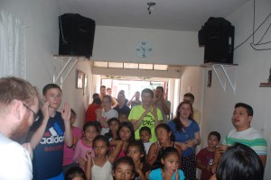 Pastor Mario's church is packed with local children and our team!